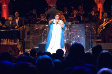 Aretha Franklin performing at the celebration for the official opening of the William J. Clinton Presidential Library November 18, 2004 in Little Rock, AK
