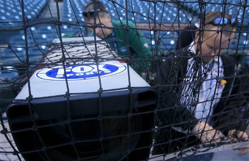 A Fox Sports television camera is adjusted in San Francisco, Monday, Oct. 18, 2010. The dispute between Fox and Cablevision that left 3 million cable subscribers in the New York area without Fox programming over the weekend has stretched into its third day. Fox is showing the NL championship series between the Philadelphia Phillies and the San Francisco Giants. (AP Photo/Jeff Chiu)