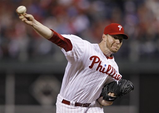 Philadelphia Phillies starting pitcher Roy Halladay delivers to a Cincinnati Reds batter during the fifth inning of Game 1 of baseball's National League Division Series, Wednesday, Oct. 6, 2010, in Philadelphia. Hally went on to toss a no-no, only the second time in baseball history. (AP Photo/Matt Slocum)