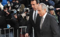 Bernard Madoff enters Manhattan federal court, Thursday, March 12, 2009, in New York. (AP Photo/ Louis Lanzano)