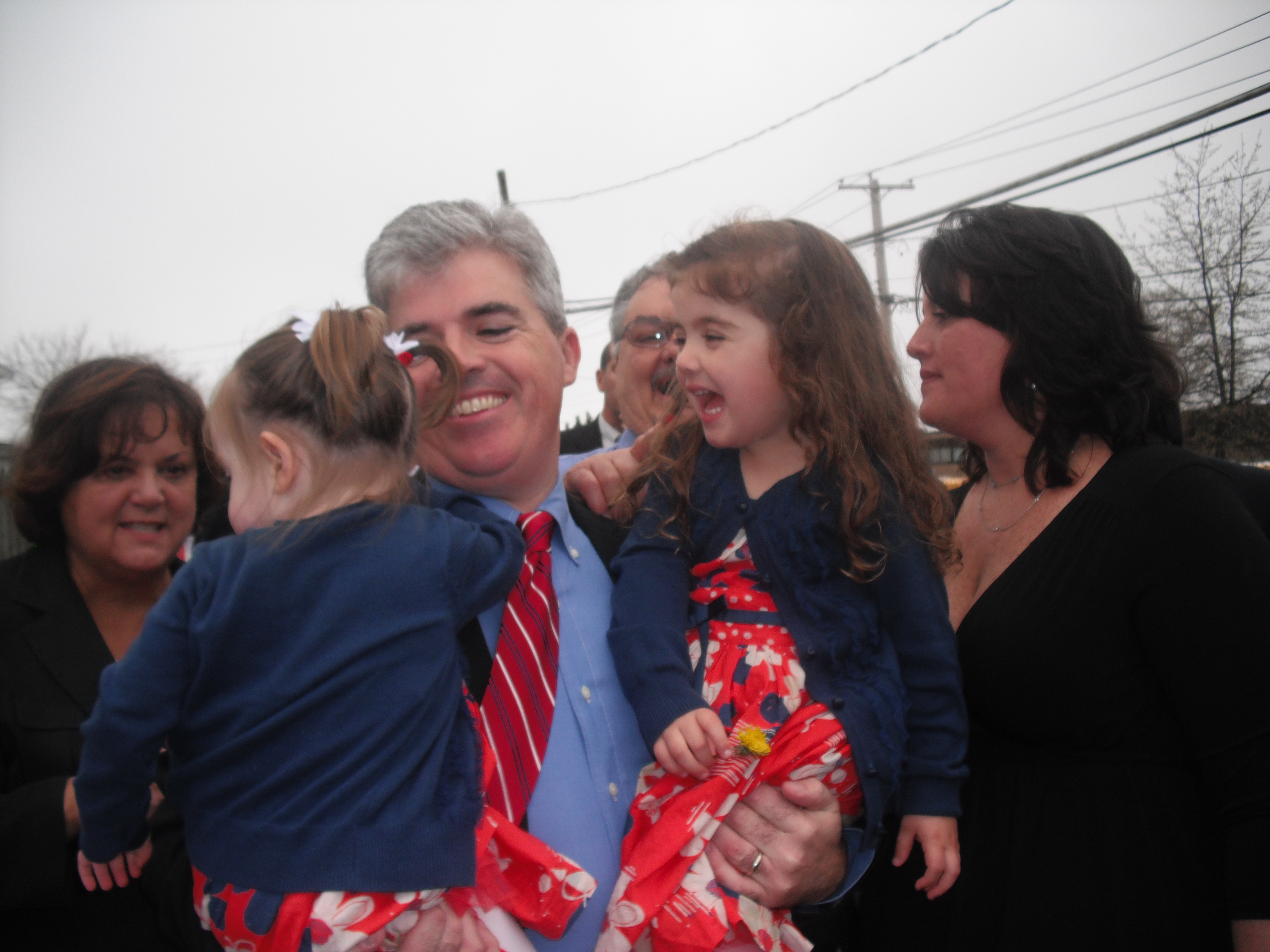 Steve Bellone with his two daughters, and wife Tracey