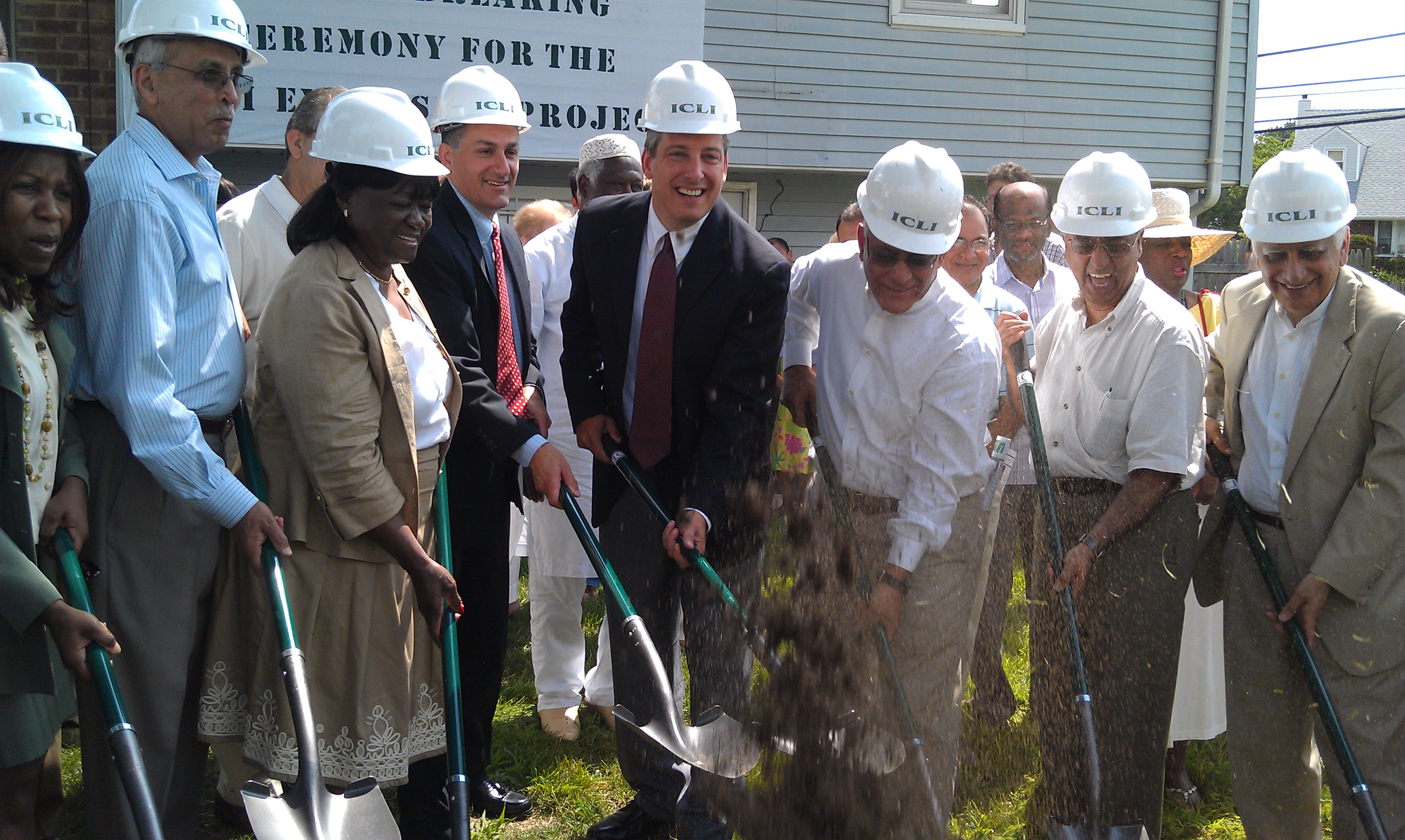 Elected officials and members of the Islamic Center of Long Island break ground on new expansion project that plans to add classrooms and additional parking in near future. (Picture by: Rashed Mian)