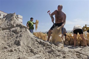Long Beach residents prepare sandbags in preparation for Hurricane Irene, Friday, Aug. 26, 2011, in Long Beach, N.Y. Long Island residents in the path of Irene girded for wind, rain and flooding as the storm stood poised to bear down on New York state. (AP Photo/Mary Altaffer)