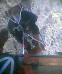 This framegrab image provided by the U.S. Coast Guard shows one of three crew members from the yacht Low Speed Chase being rescued from the Farallon Islands west of San Francisco Saturday April 14, 2012 by the U.S. Coast Guard. The sail boat carrying eight crew members ran aground during a race off San Francisco Saturday, killing one person and leaving four others missing, the Coast Guard said. (AP Photo/US Coast Guard)