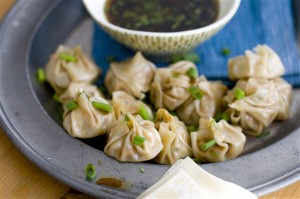 In this image taken on October, 31, 2011, wonton skins are filled with a spicy ground pork mixture, then briefly steamed to create delicious Asian-style dumplings as shown in Concord, N.H. (AP Photo/Matthew Mead)