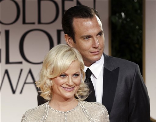 This Jan. 15, 2012 file photo shows actors Amy Poehler, left, and Will Arnett arriving at the 69th Annual Golden Globe Awards in Los Angeles. The couple is separating after 9 years of marriage, their publicist Lewis Kay confirmed Thursday, Sept. 6. Poehler and Arnett have two young sons, 3-year-old Archie and 2-year-old Abel. (AP Photo/Matt Sayles, file)