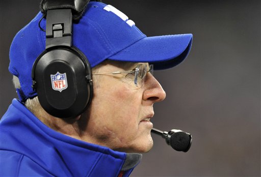New York Giants head coach Tom Coughlin looks on from the sideline in the first half of an NFL football game against the Baltimore Ravens in Baltimore, Sunday, Dec. 23, 2012. (AP Photo/Gail Burton)