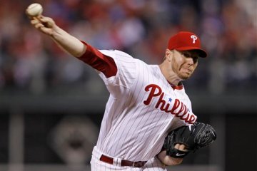 Philadelphia Phillies starting pitcher Roy Halladay delivers to a Cincinnati Reds batter during the fifth inning of Game 1 of baseball's National League Division Series, Wednesday, Oct. 6, 2010, in Philadelphia. Hally went on to toss a no-no, only the second time in baseball history. (AP Photo/Matt Slocum)