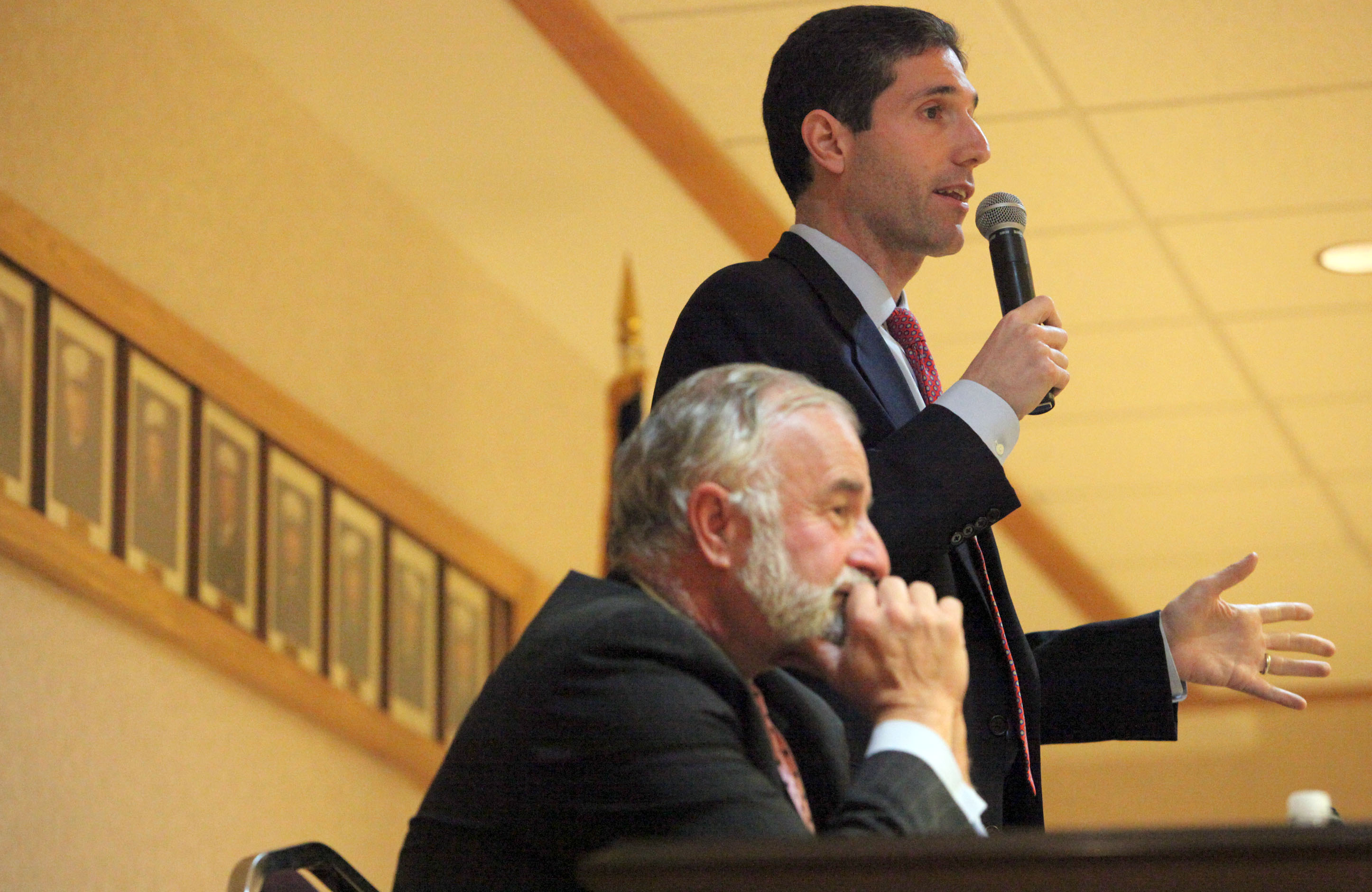 U.S. Rep. Tim Bishop (D-Southampton), foreground and his GOP challenger, Randy Altschuler, at a recent meet the candidates forum. (Joel Cairo/Long Island Press)