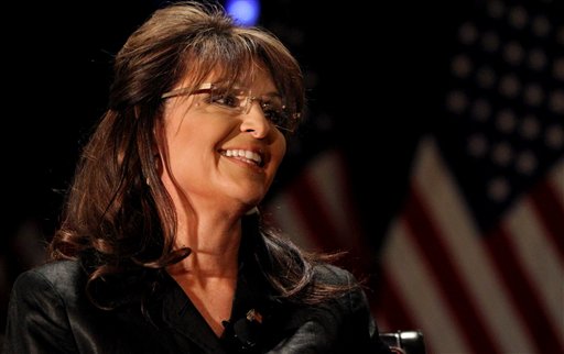 Former Alaska Gov. Sarah Palin smiles as she is introduced during a public appearance at a Long Island Association (LIA) meeting and luncheon in Woodbury, N.Y., Thursday, Feb. 17, 2011. (AP Photo/Craig Ruttle)