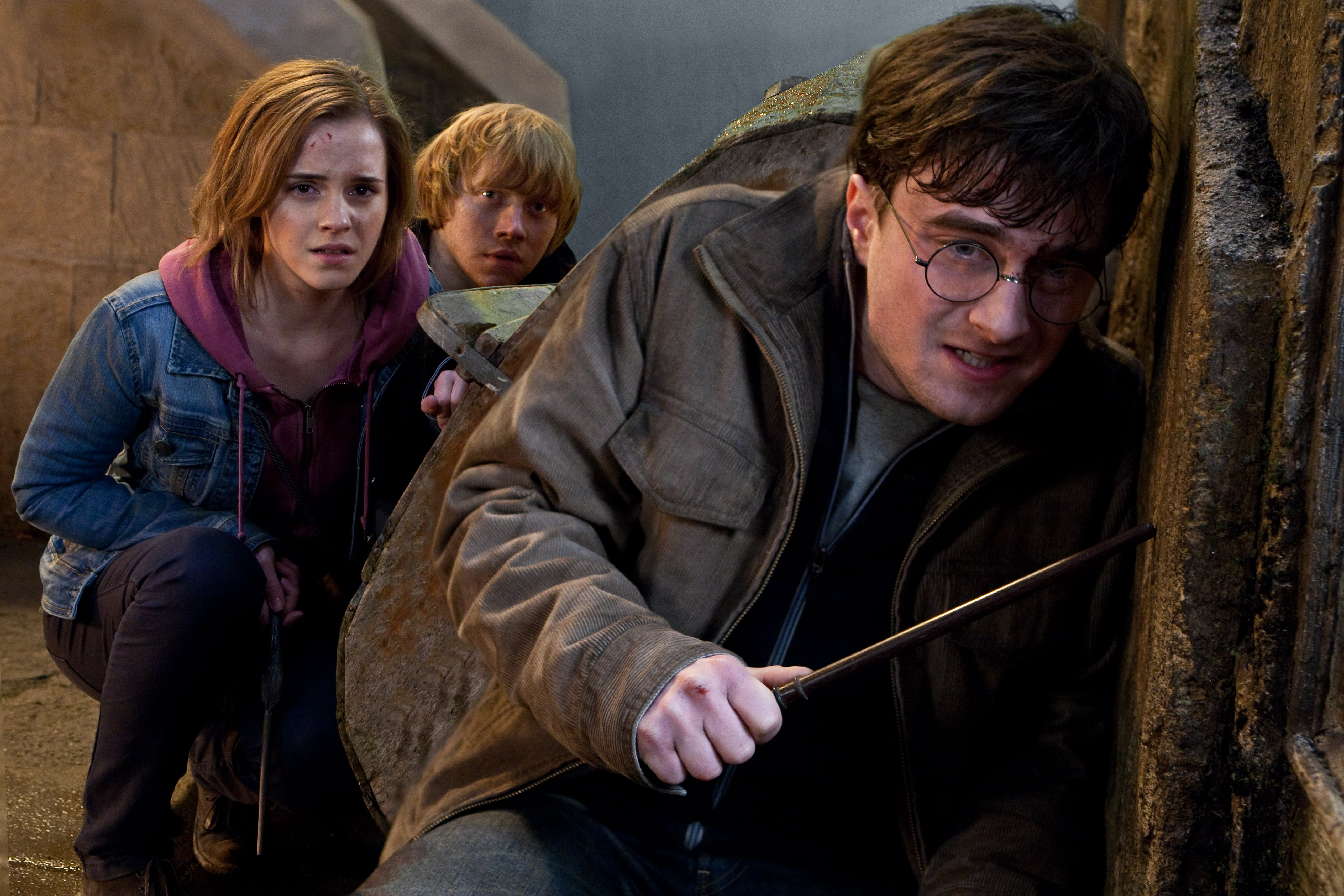 (L-r) EMMA WATSON as Hermione Granger, RUPERT GRINT as Ron Weasley and DANIEL RADCLIFFE as Harry Potter in Warner Bros. Picturesâ fantasy adventure âHARRY POTTER AND THE DEATHLY HALLOWS â PART 2,â a Warner Bros. Pictures release.