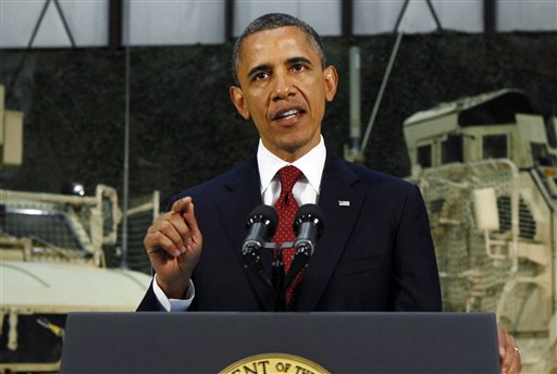 President Barack Obama delivers a speech from Bagram Air Field, Afghanistan, Tuesday, May 2, 2012. (AP Photo/Kevin Lamarque, Pool)