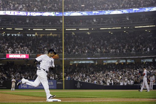 Cano powers Yankees to AL East title in 14-2 rout